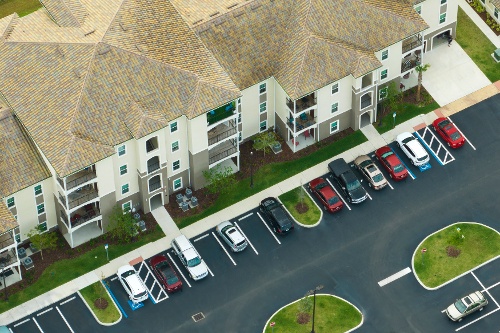 cars-parked-on-parking-place-of-new-apartment-cond-2023-09-30-02-55-00-utc-1