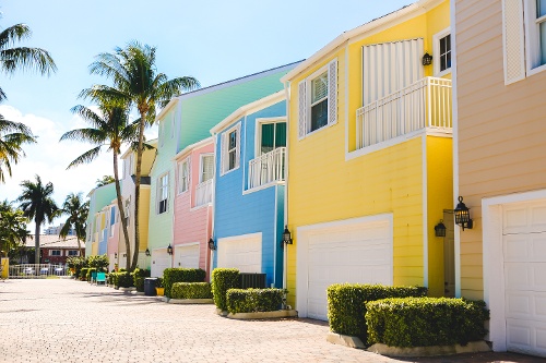 sunny-day-pastel-colored-apartments-houses-and-h-2022-11-15-18-02-38-utc-1