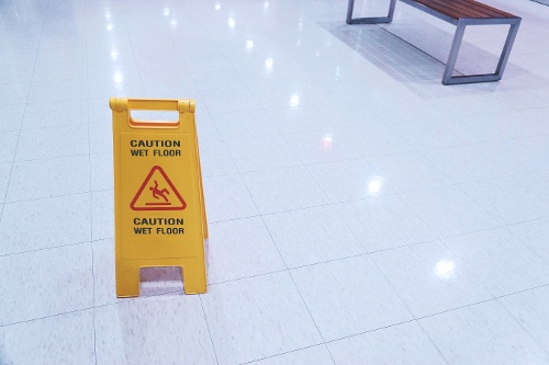 yellow-sign-showing-warning-of-caution-wet-floor-2022-11-02-00-17-16-utc-1